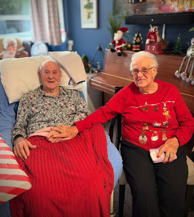husband and wife at christmas 